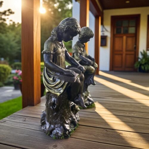 Boy and girl reading a book statues | (SET OF 2)