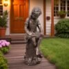 Boy and girl reading a book statues | (SET OF 2)