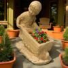 Girl Pushing a Wheelbarrow Concrete Statue